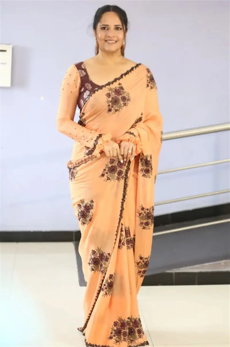 Telugu Actress Anasuya Bharadwaj In Beautiful Orange Saree